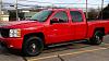 Red truck, black rims, post em up-image.jpg